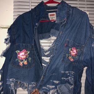 Distressed denim jacket fits a lot of sizes